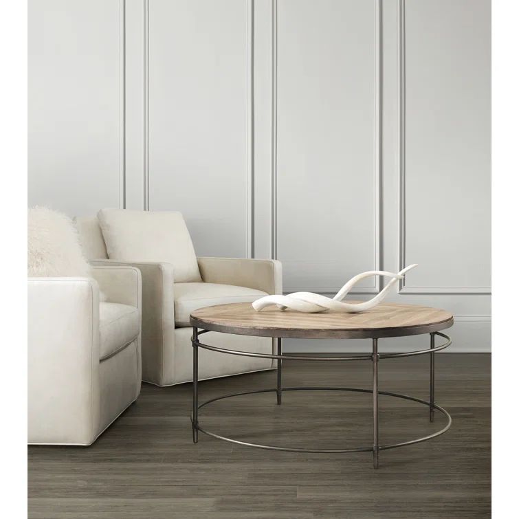Transitional Round Cocktail Table with Storage in Black and Brown