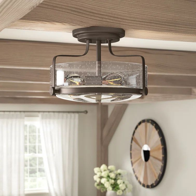 Harper Transitional Clear Seedy Glass 3-Light Ceiling Fixture in Oil Rubbed Bronze