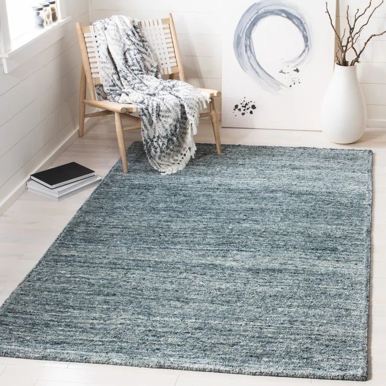 Handmade Himalaya Tufted Blue Wool Rectangular Rug - 5' x 8'
