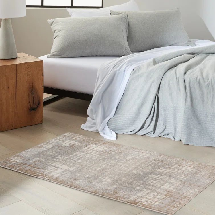 Ivory and Taupe Abstract Rectangular Synthetic Rug