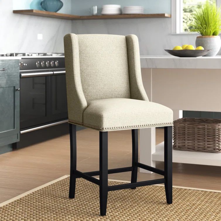 Beige Upholstered Wood Counter Stool with Nailhead Trim