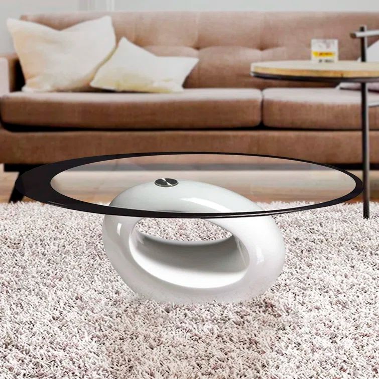 White Oval Glass Top Coffee Table with Abstract Base