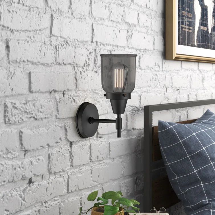 Caden Matte Black and Glass Industrial Wall Sconce