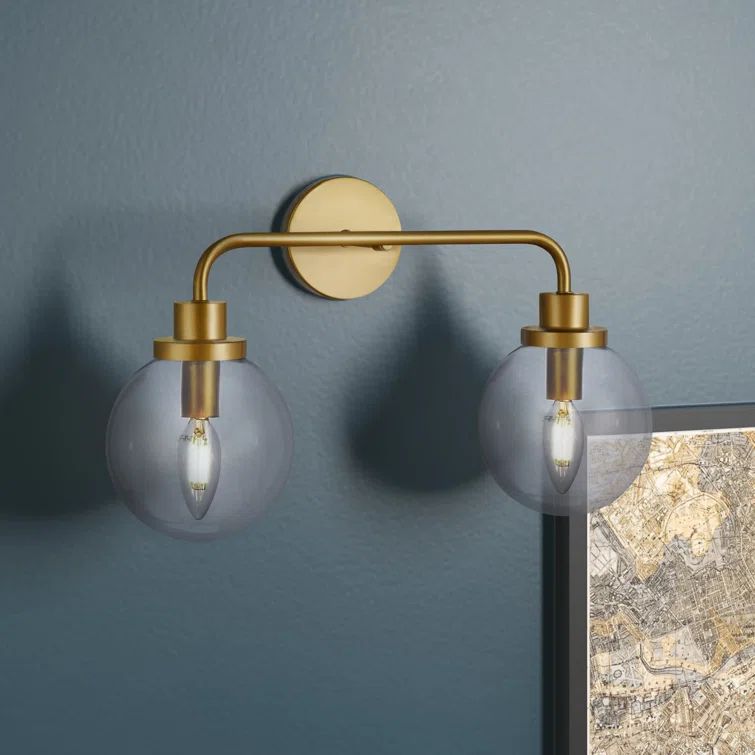 Elegant Hanson Brass 2-Light Bath Sconce with Clear Round Shade