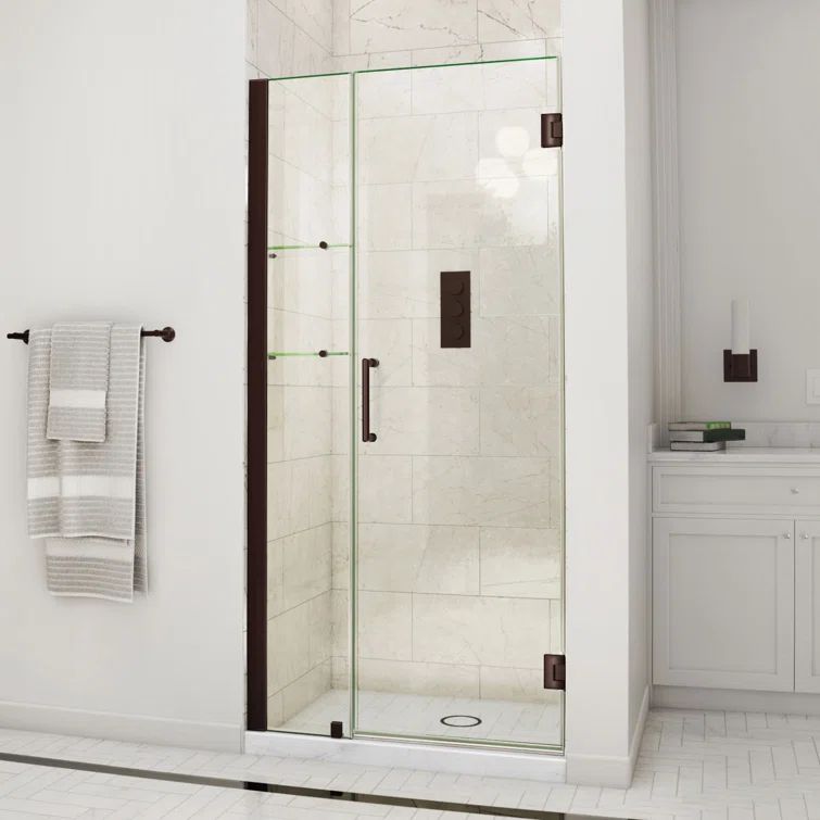 Unidoor Frameless Clear Glass Hinged Shower Door with Oil Rubbed Bronze Hardware