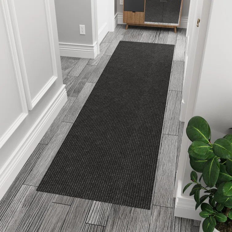 Modern Utility Black Synthetic 31x118 Ribbed Indoor/Outdoor Runner Rug