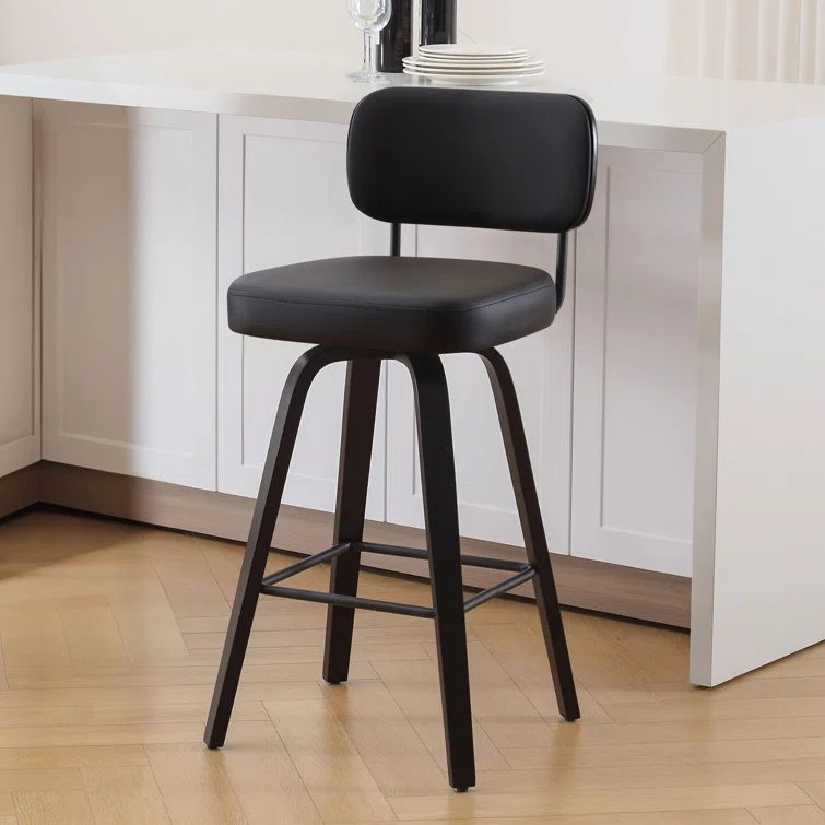 Black Swivel Upholstered Counter Stool with Wood Legs
