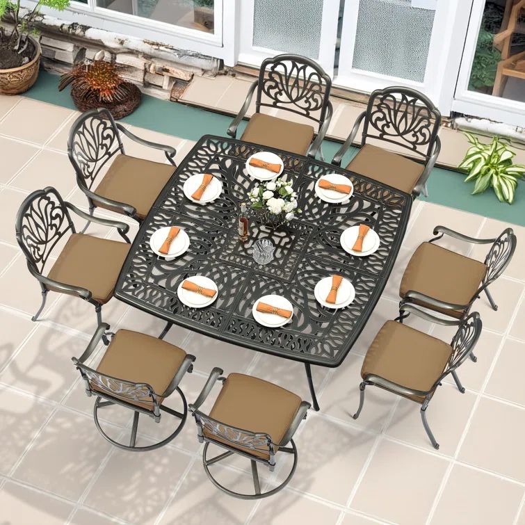 Antique Bronze 9-Piece Outdoor Dining Set with Khaki Cushions