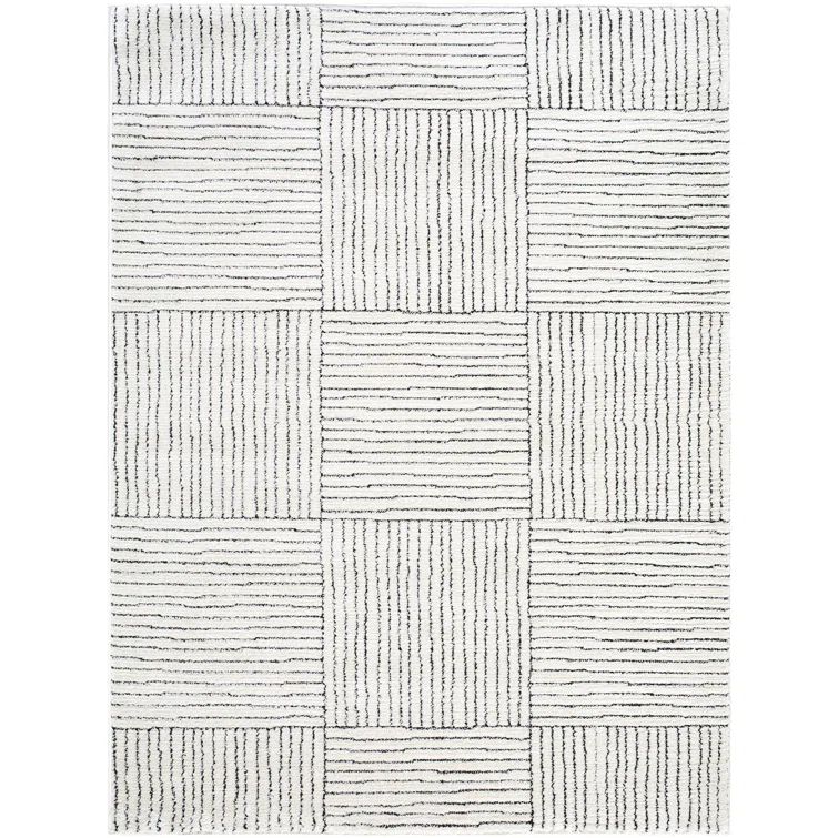 Ivory and Black Geometric Patterned Synthetic Area Rug, 5' x 7'