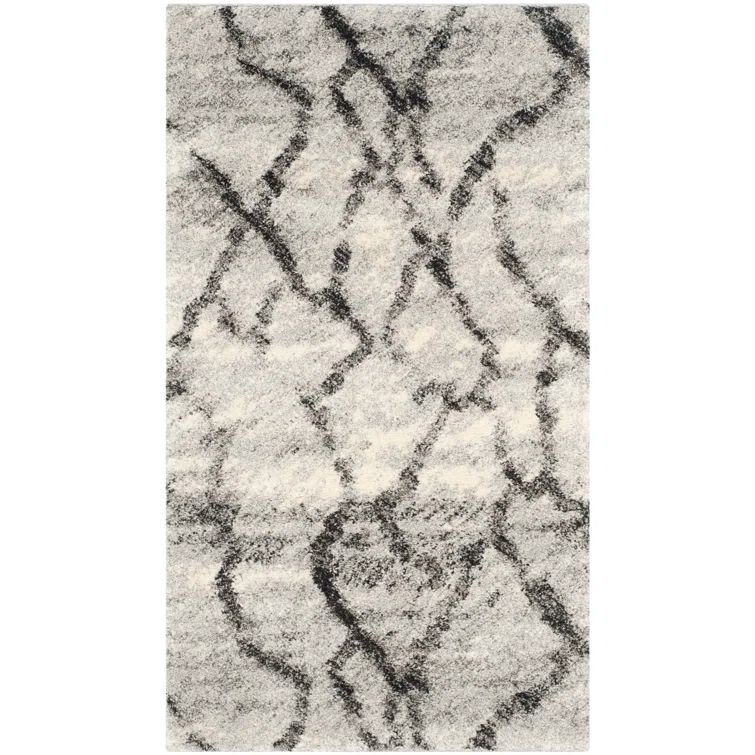 Abstract Elegance 30'' Black Synthetic Easy-Care Shag Rug