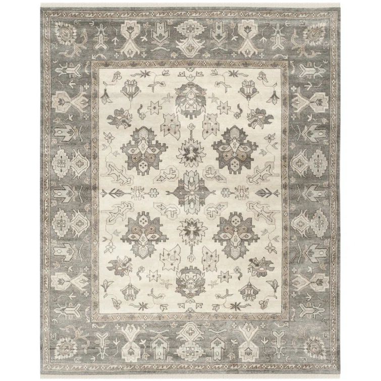 Handmade Ivory Wool 9' x 12' Rectangular Area Rug