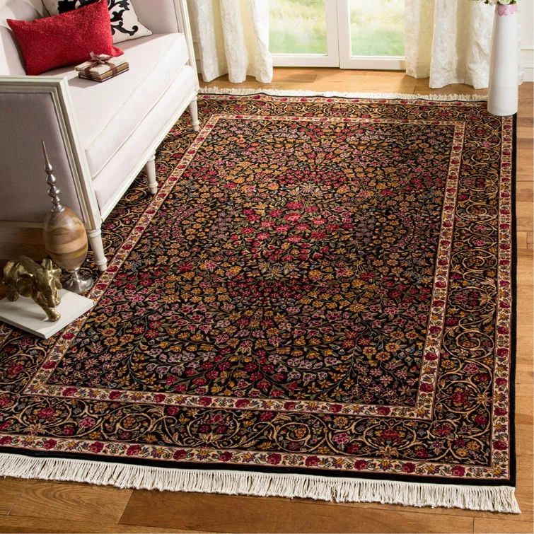 Handmade Ivory and Black Floral Wool Area Rug, 6' x 9'