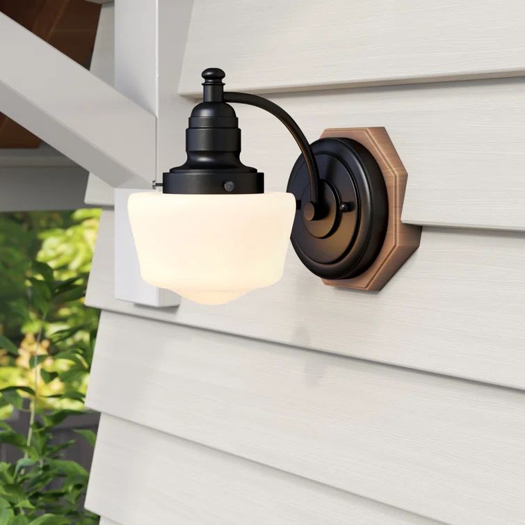 Eddystone Textured Black Outdoor Wall Sconce with White Opal Glass