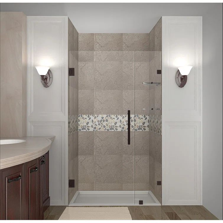Nautis GS Clear Glass Frameless Hinged Shower Door in Bronze