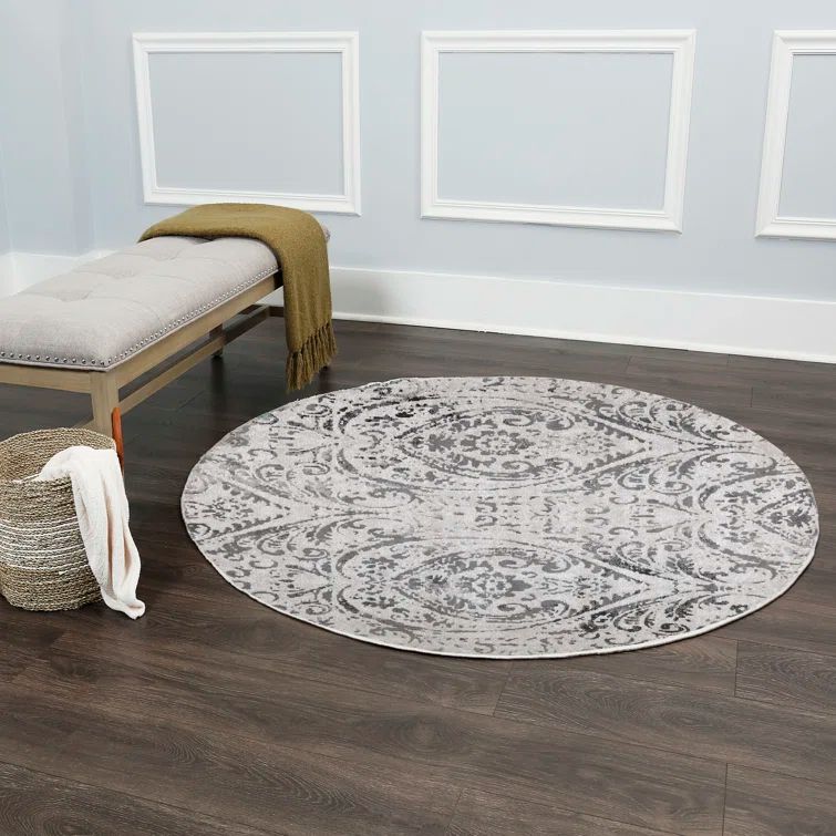 Ivory and Grey Round Synthetic Paisley Area Rug