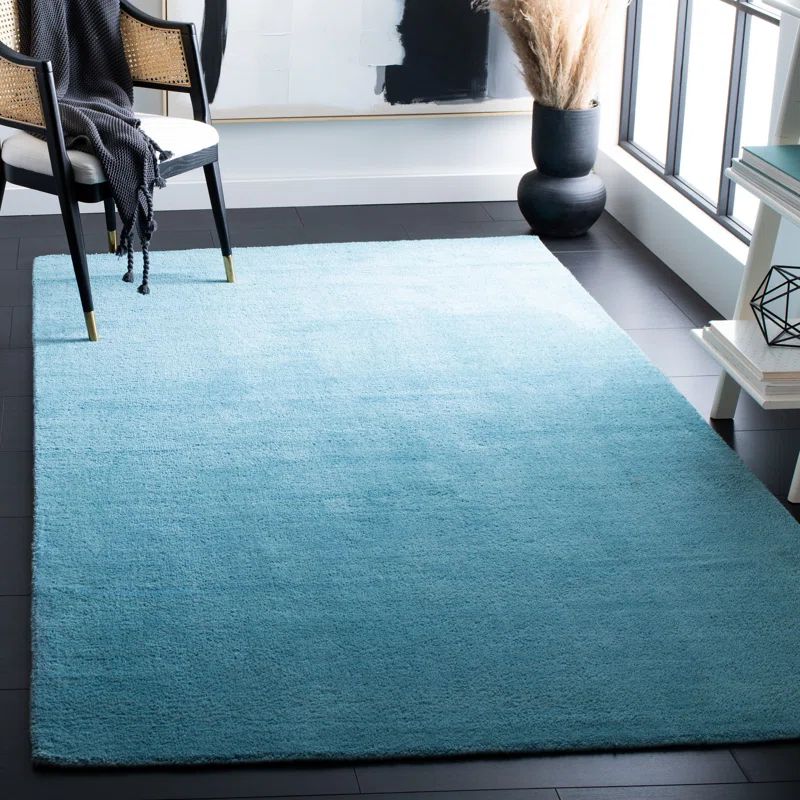 Turquoise Tufted Handmade Wool 5' x 8' Area Rug