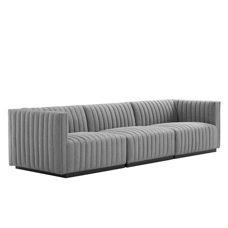 Elegant Light Gray Velvet Sofa with Channel Tufting and Black Legs