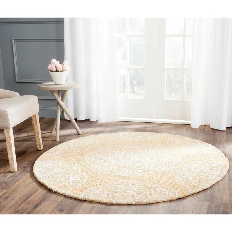 Bella Beige and White Round Hand-Tufted Wool Rug
