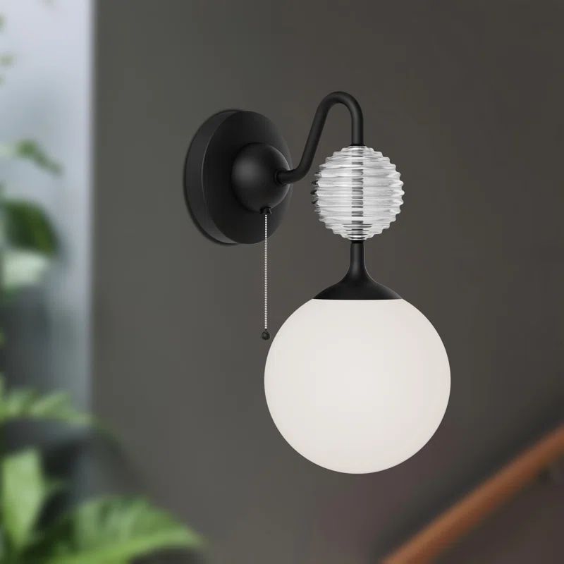 Celia Matte Black and Opal Glass Ribbed Wall Sconce