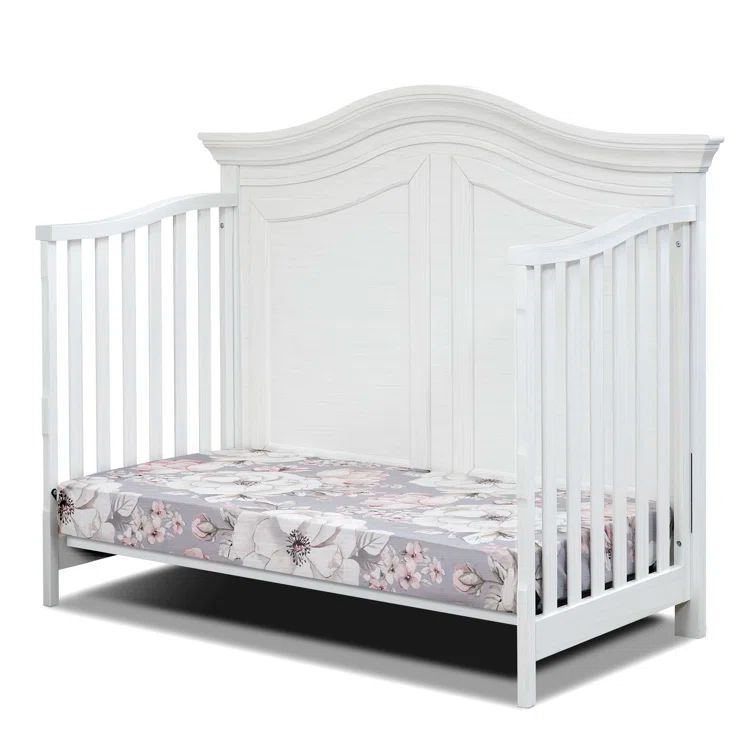 Vintage White Wooden Convertible Crib with Flowing Curves