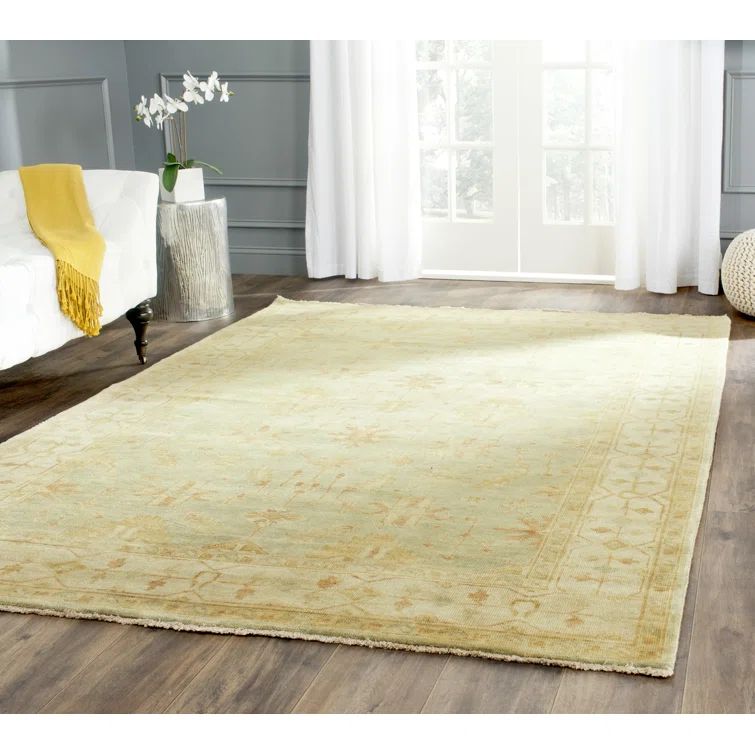 Elegant Ivory Wool 9' x 12' Hand-Knotted Oushak Area Rug
