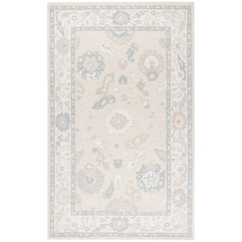 Ivory and Beige 4' x 6' Hand Tufted Wool Rug