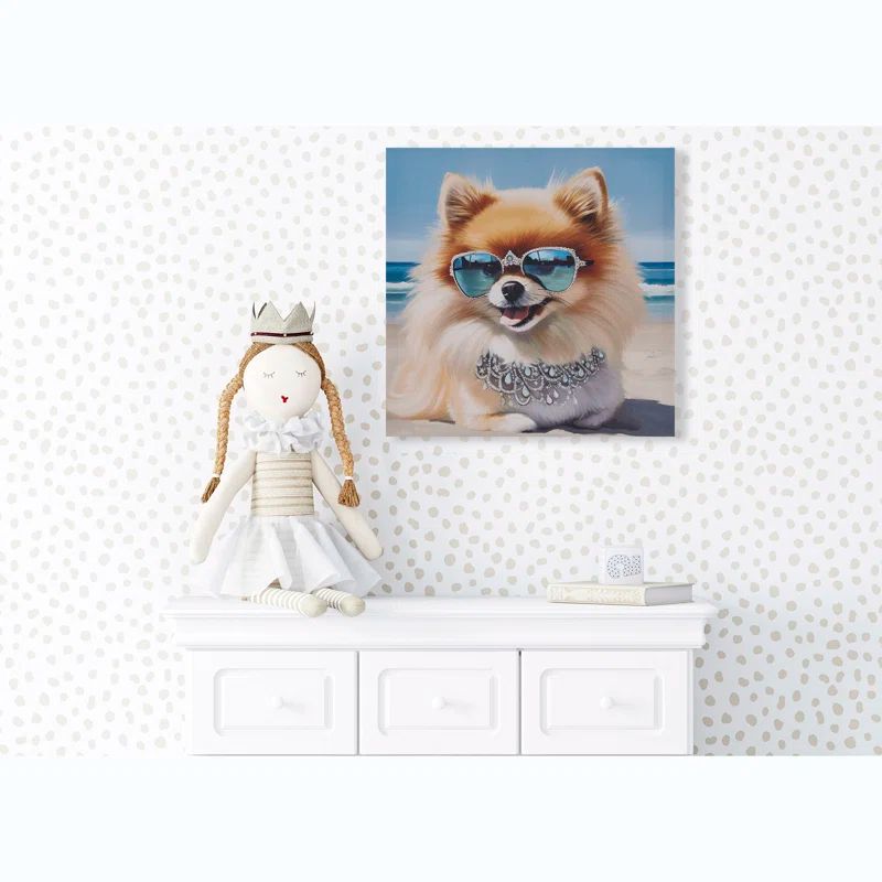 Playful Pomeranian Beach Day Canvas Wall Art in Multicolor