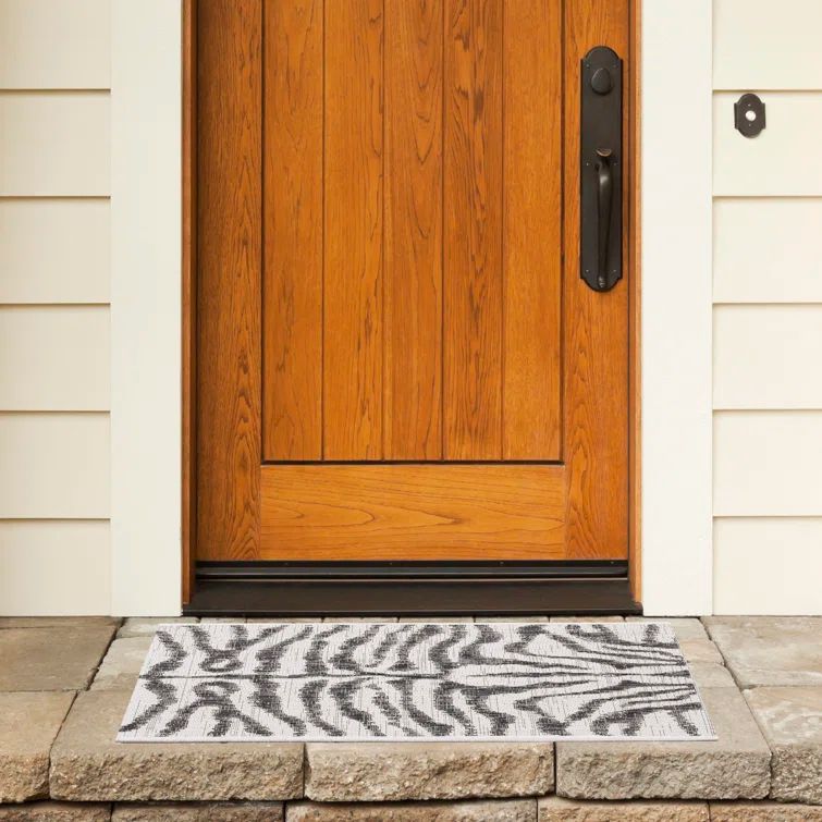 Ivory and Black Zebra Print Indoor/Outdoor Area Rug