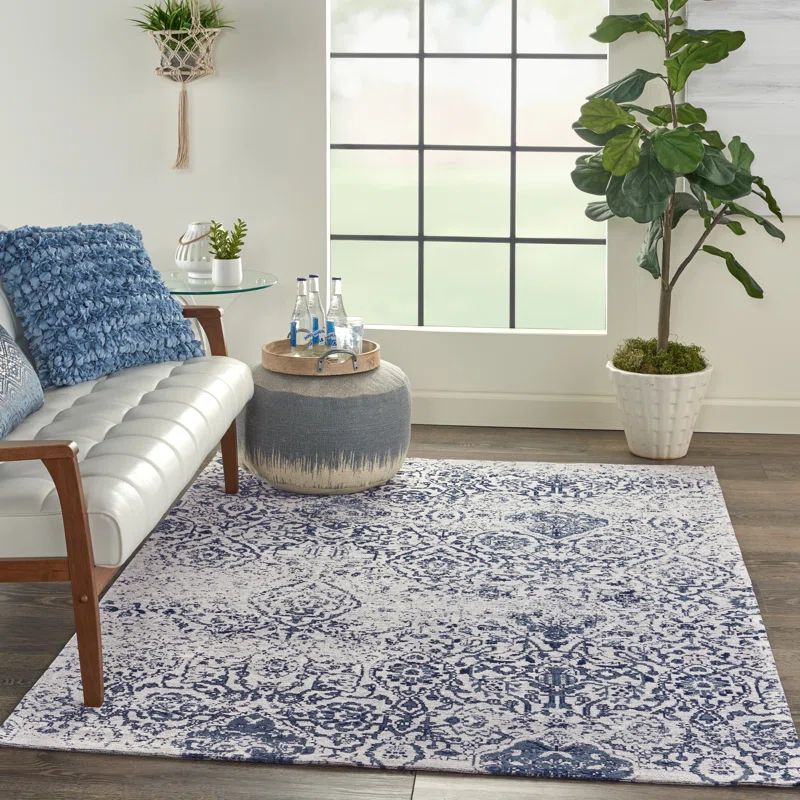 Ivory and Navy Medallion Synthetic 4' x 6' Area Rug