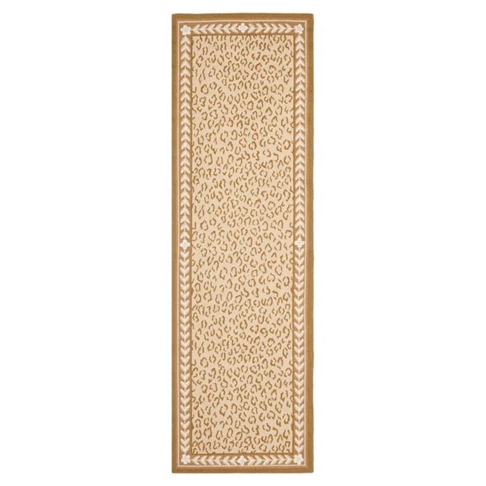 Handmade Oval Ivory Wool Animal Print Area Rug