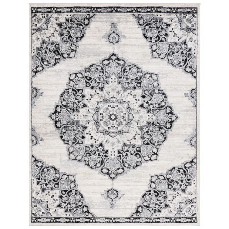 Ivory and Black Synthetic Rectangular 8' x 10' Area Rug