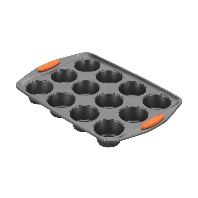 Gray Non-Stick Carbon Steel 12-Cup Muffin Pan with Orange Handles