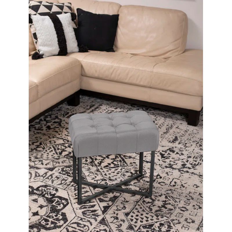 Compact Gray Linen Tufted Ottoman with Black Metal Legs