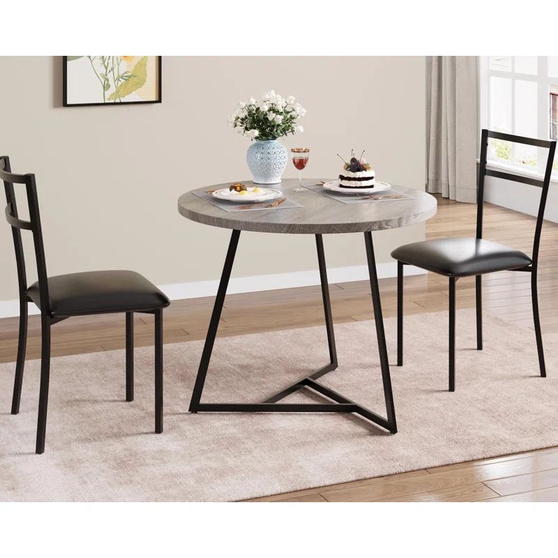 Rustic Gray Round Dining Table Set with Black Upholstered Chairs