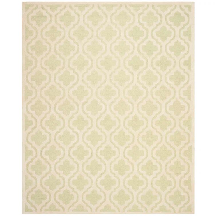 Handmade Light Green and Ivory Tufted Wool Round Rug