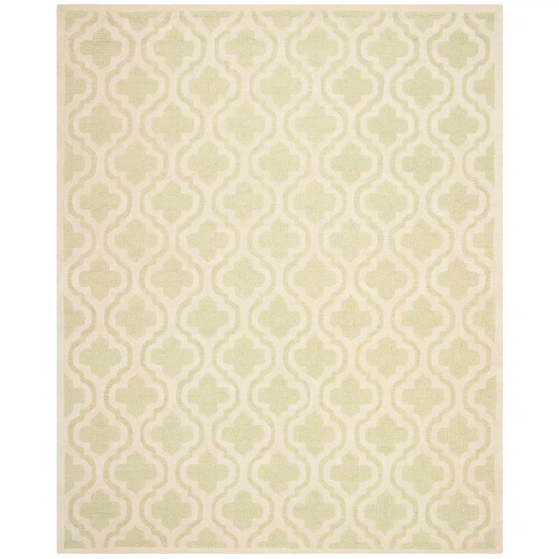 Handmade Light Green and Ivory Tufted Wool Round Rug