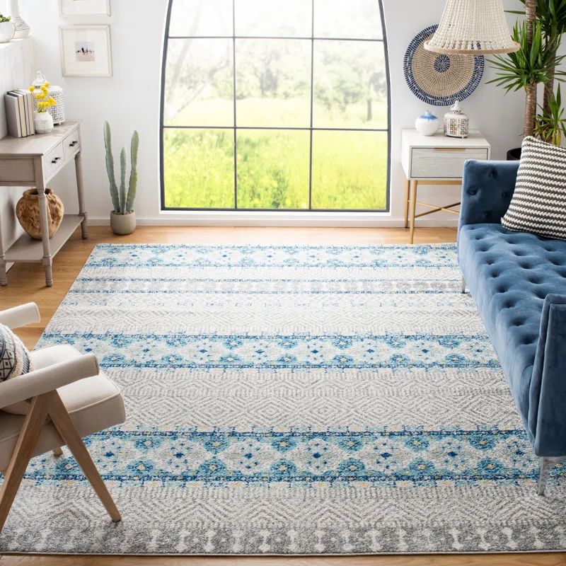 Rectangular 10' x 14' Grey and Turquoise Synthetic Area Rug