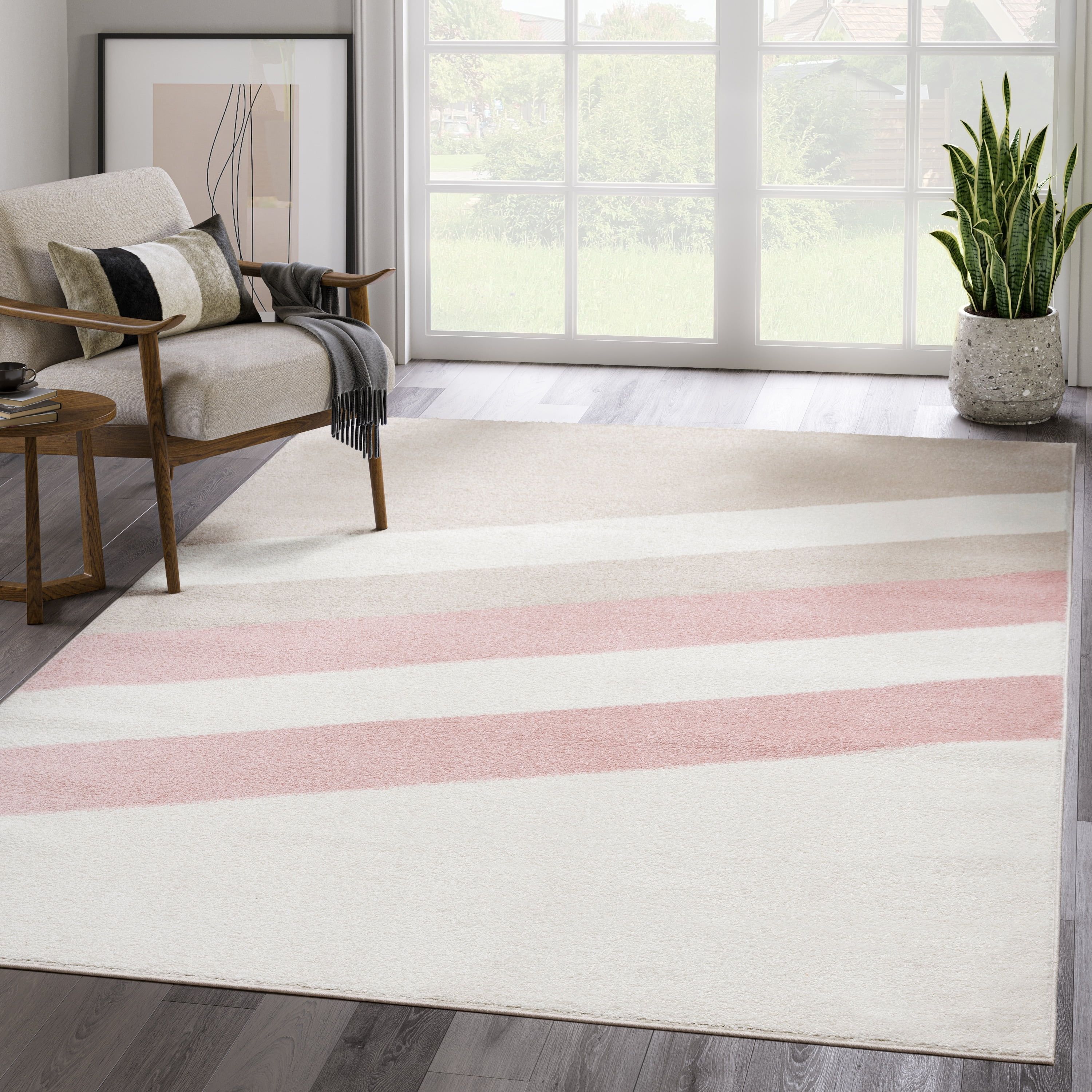 Ivory and Beige 4' x 6' Striped Synthetic Area Rug