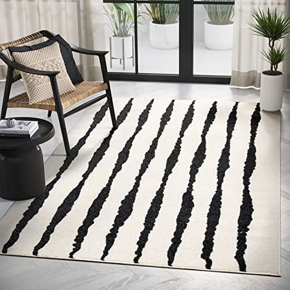 4' x 6' Black and Cream Striped Synthetic Area Rug