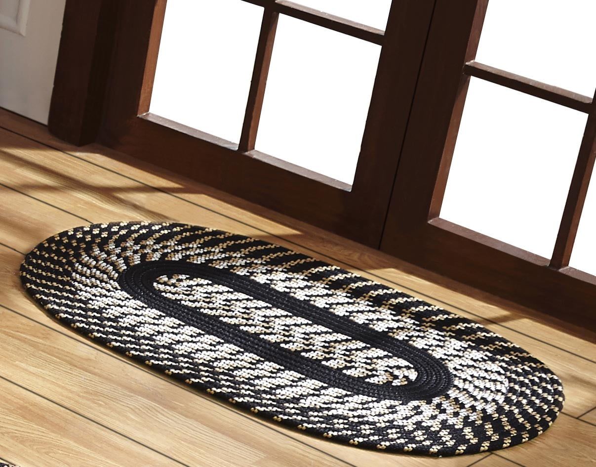 Black and White Oval Braided Synthetic Area Rug 8' x 10'