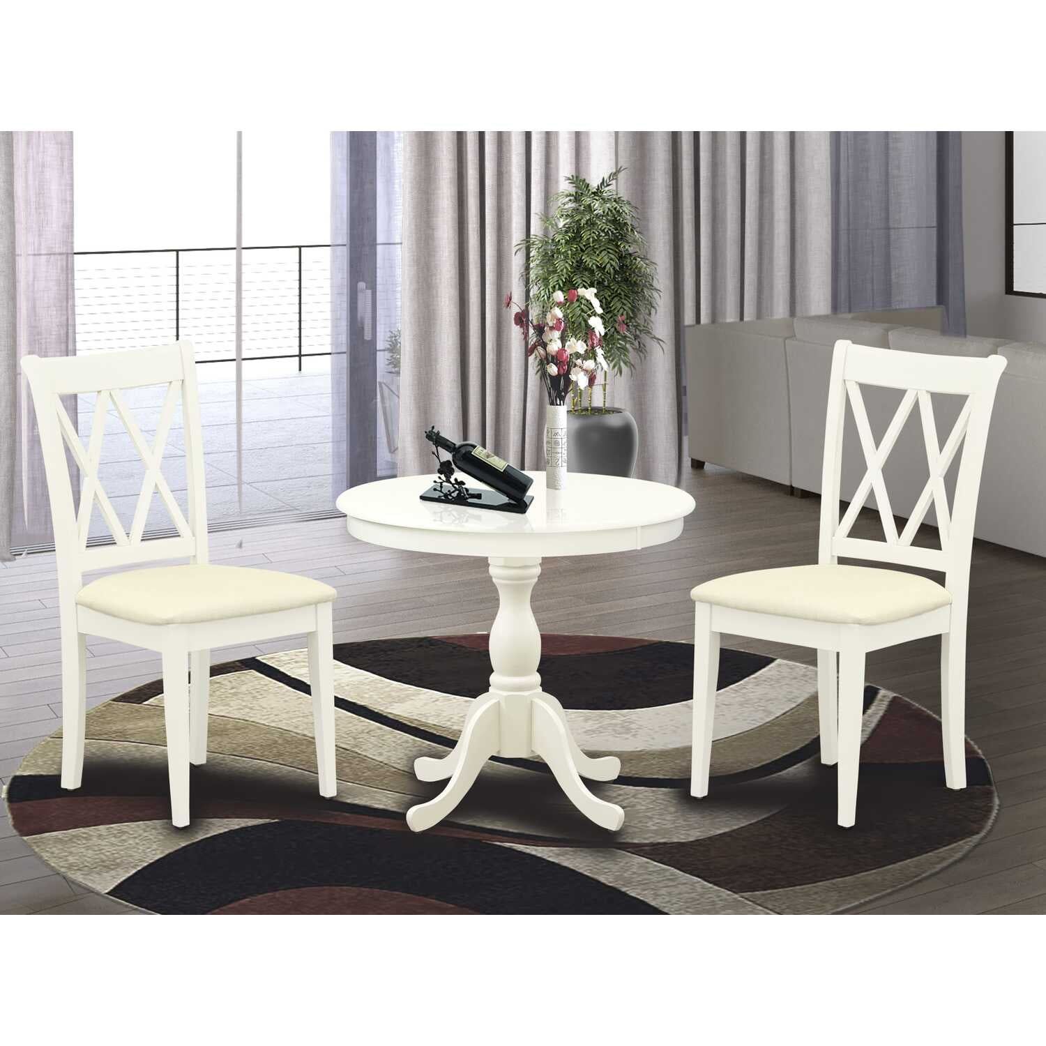 Linen White Round Pedestal Table with Double X-Back Chairs