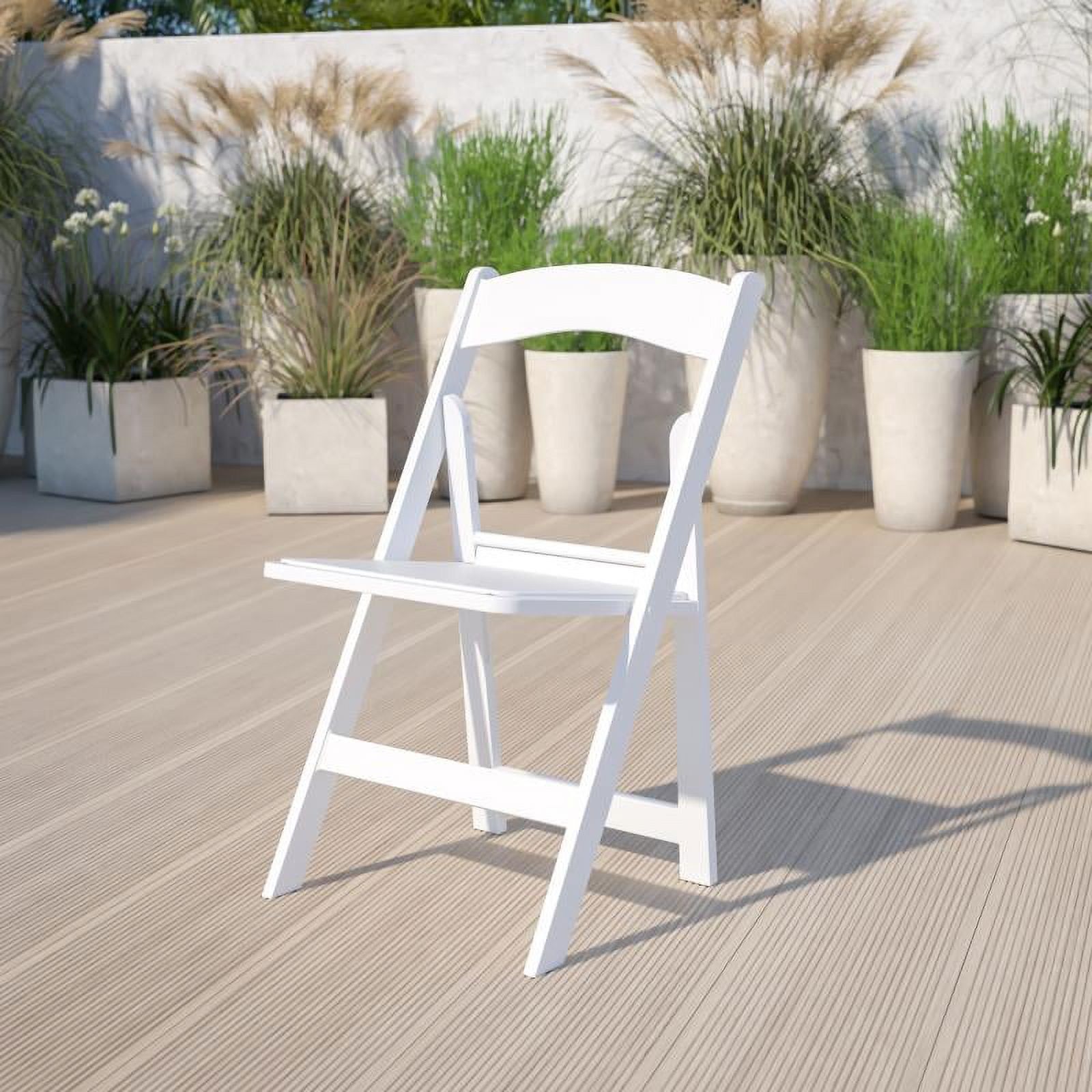 Elegant White Resin Lightweight Folding Chair with Cushioned Seat