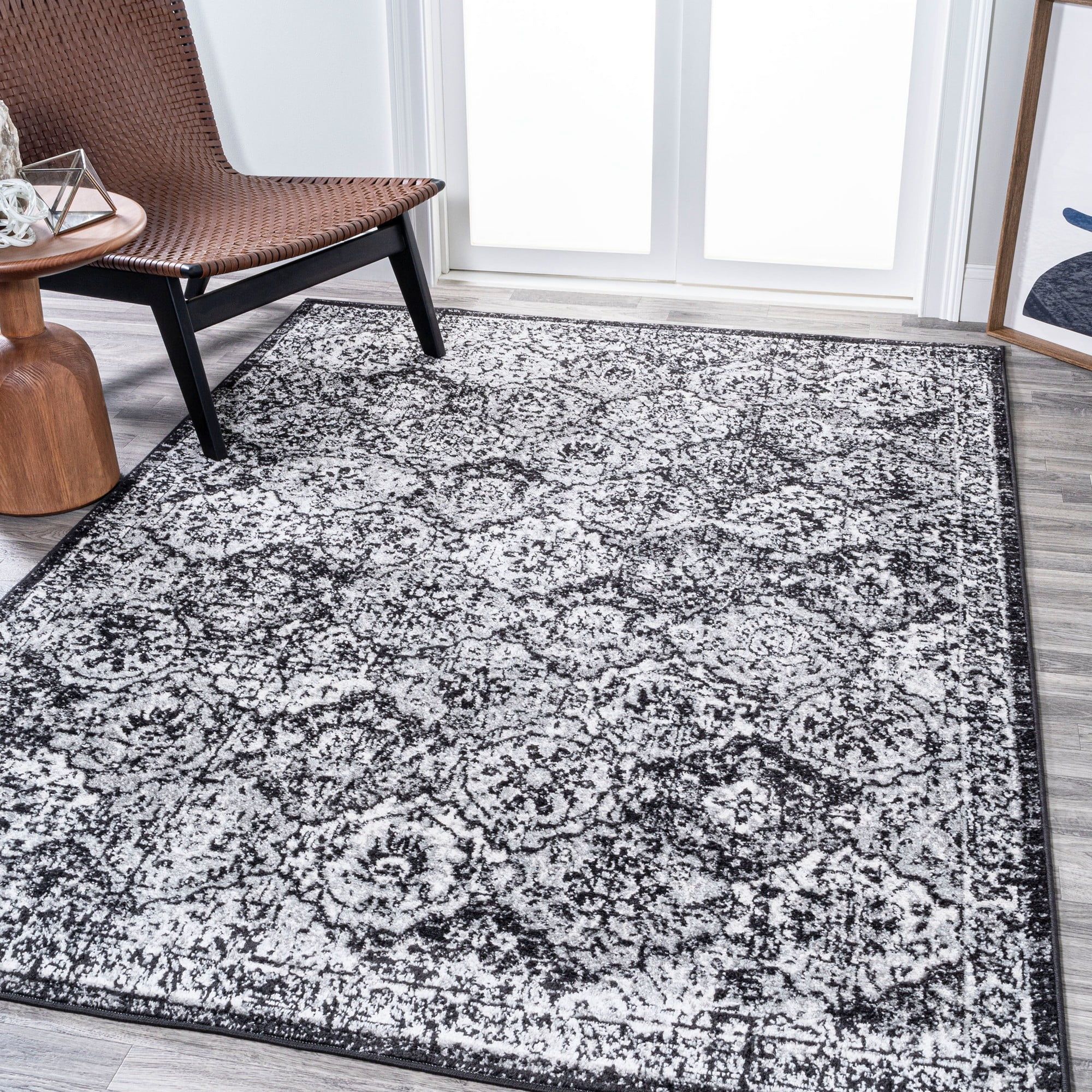 Black and Ivory 4' x 6' Synthetic Persian Area Rug