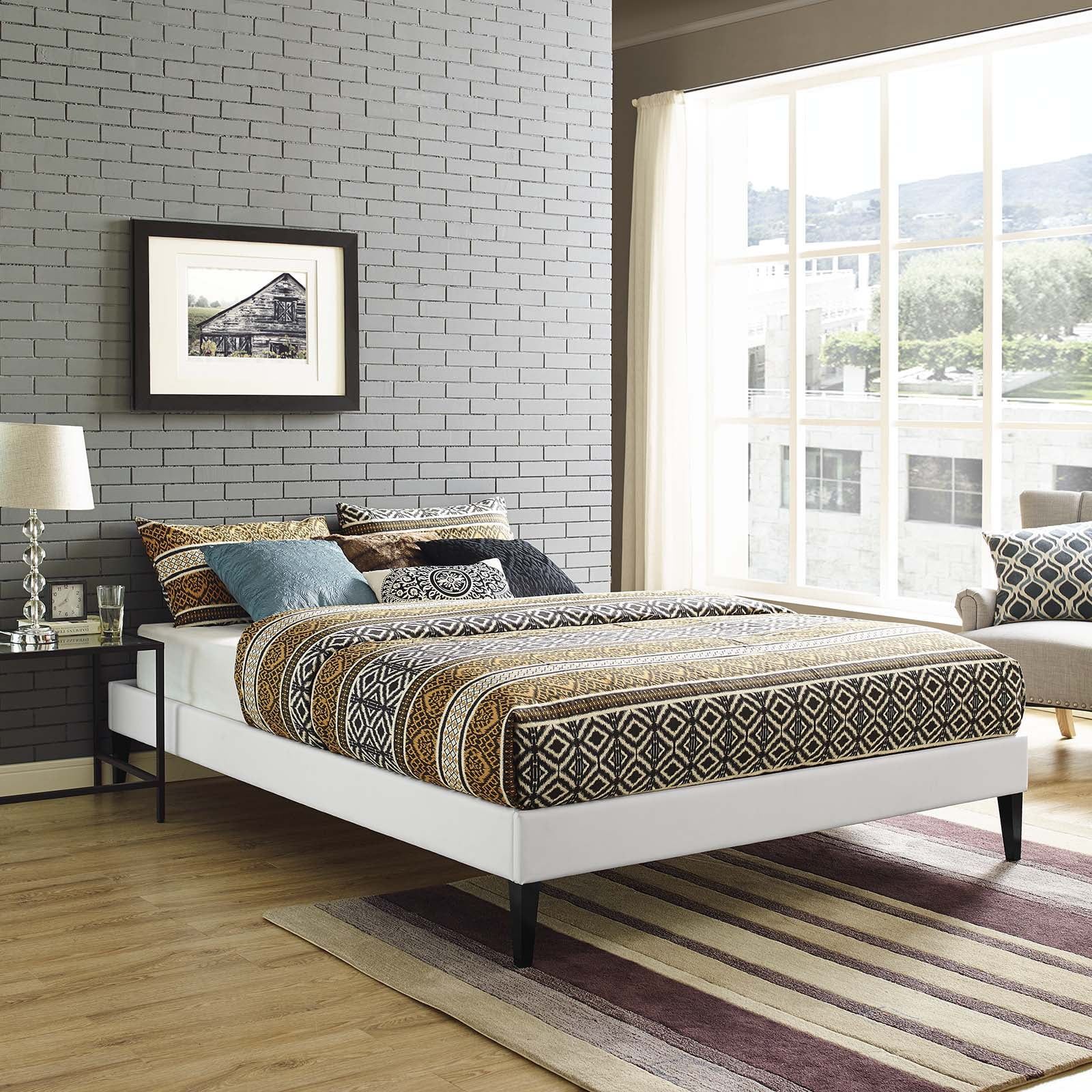 Sleek White Queen Platform Bed with Faux Leather Upholstery