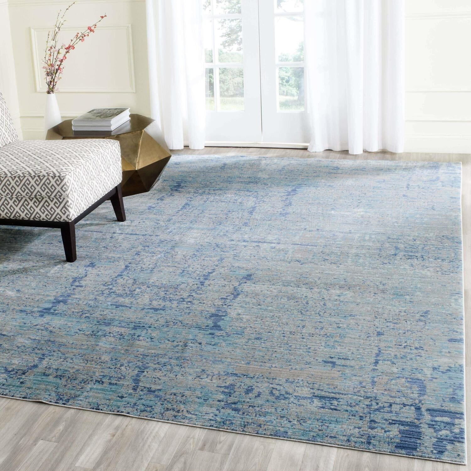 Luminous Light Blue Abstract 8' x 10' Synthetic Area Rug