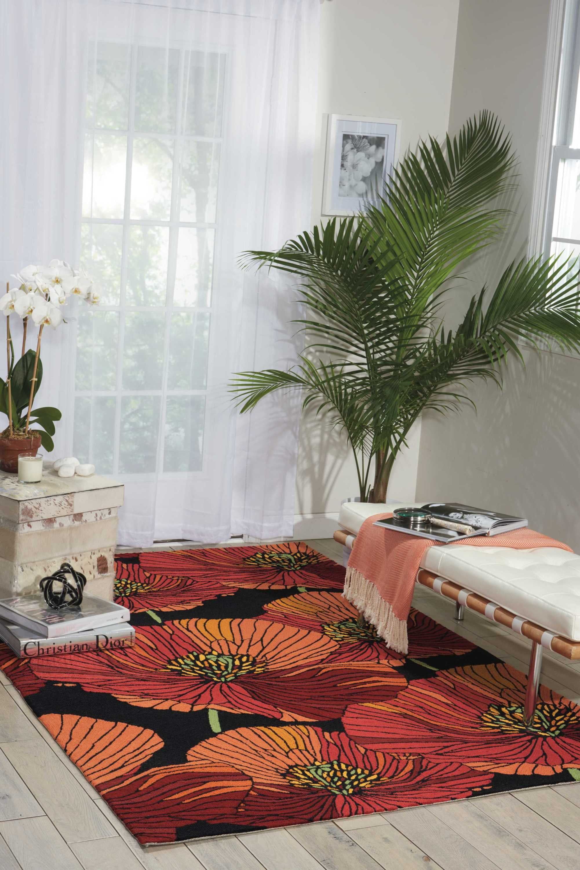 Handmade Black and Orange Floral Synthetic Rectangular Rug 4' x 6'