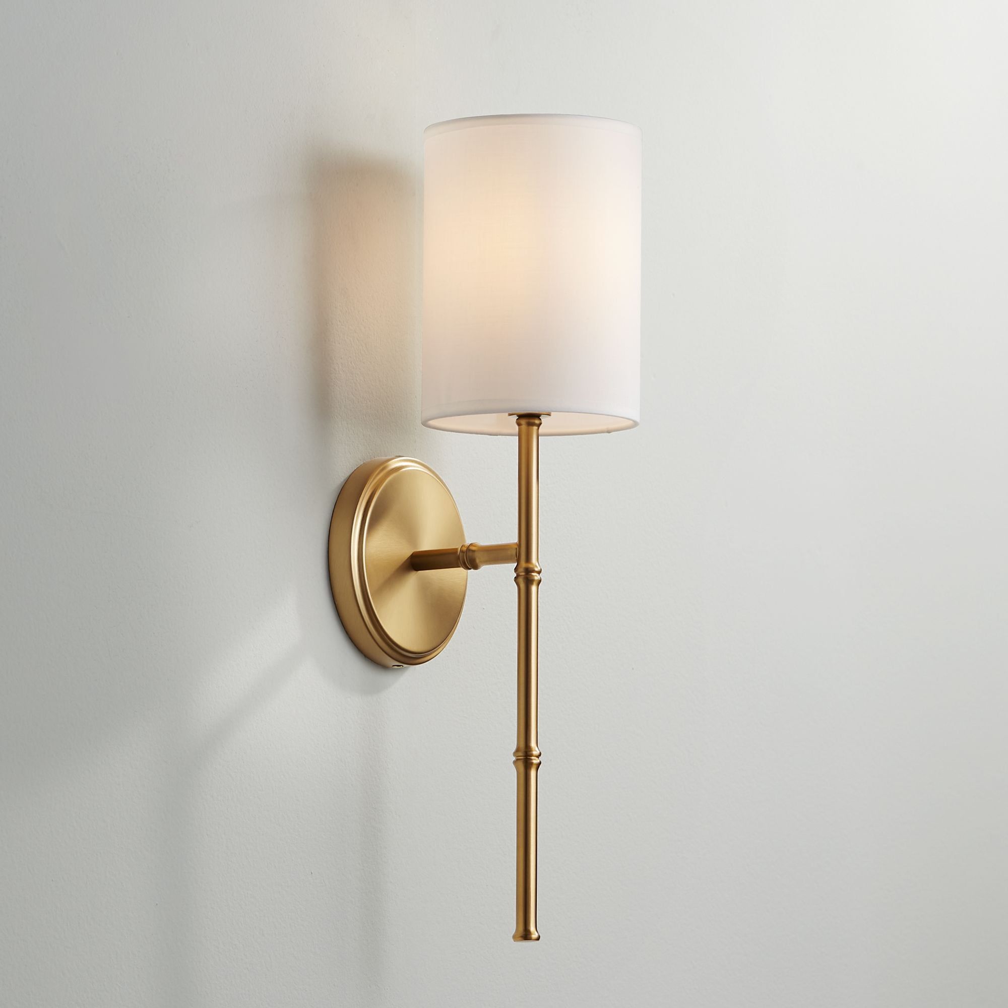 Abigale Brass and White Fabric Wall Sconce