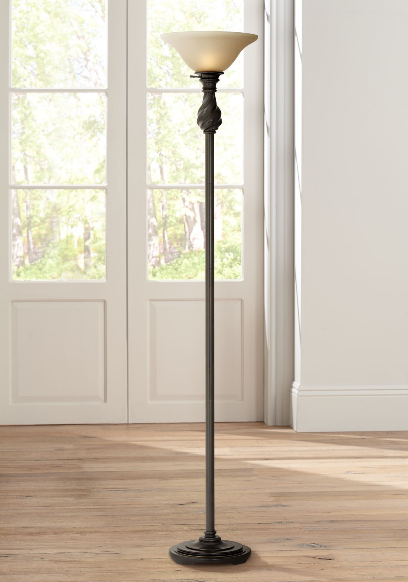 Elegant Bronze Torchiere Floor Lamp with Amber Glass Shade