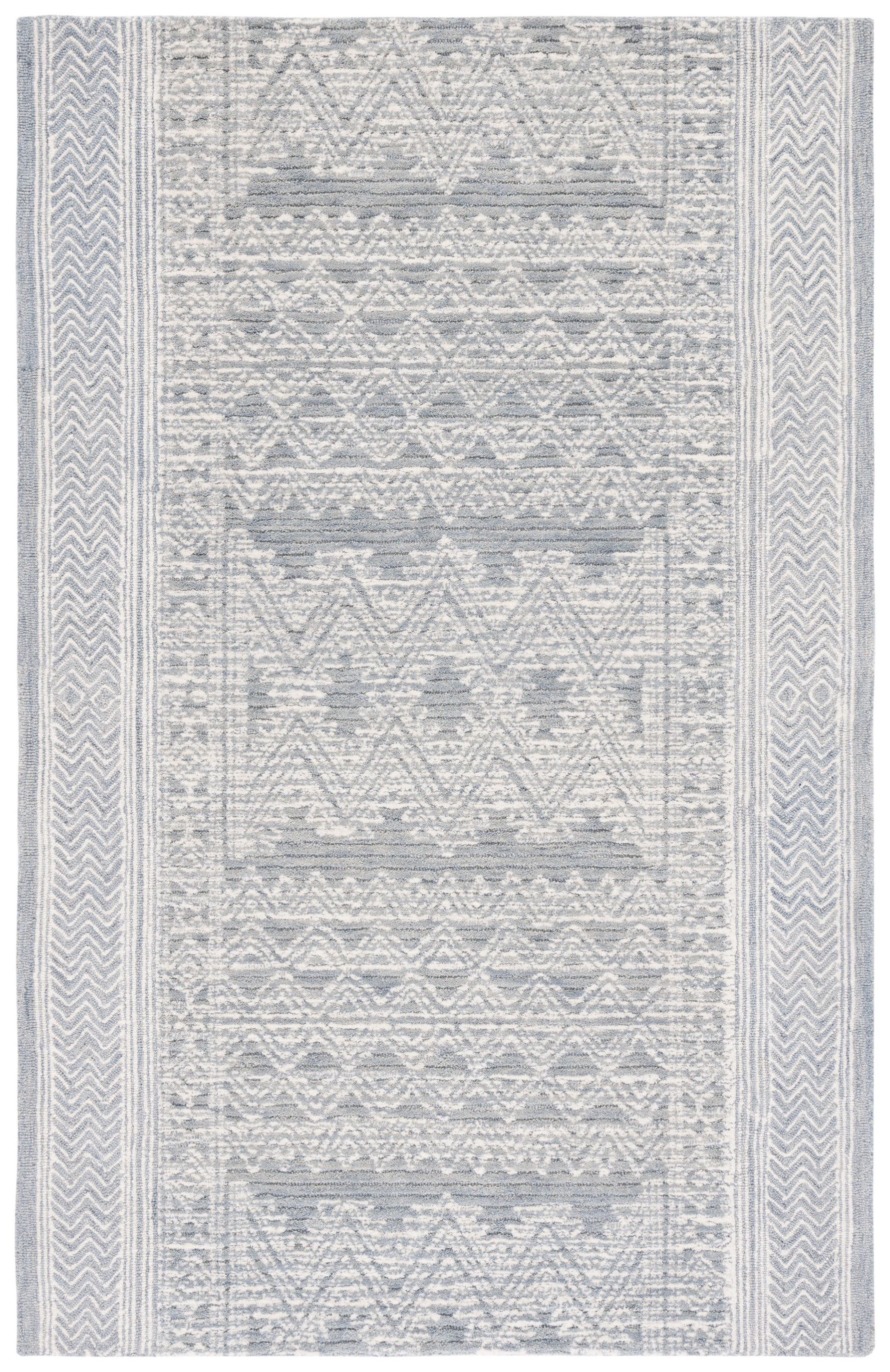 Light Blue and Ivory Wool Abstract Tufted Area Rug, 6' x 9'