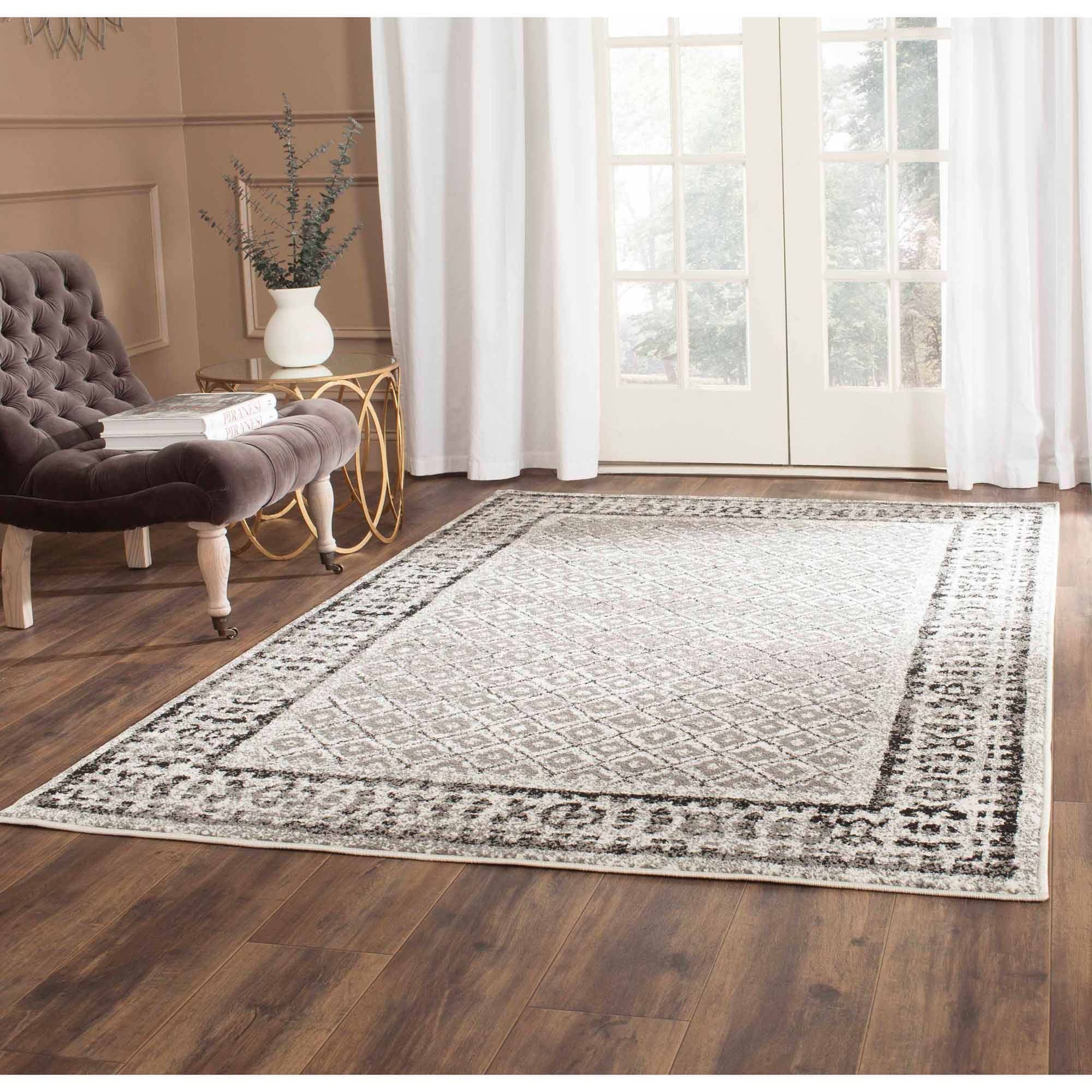 Ivory Geometric Easy-Care Synthetic 8' x 10' Area Rug